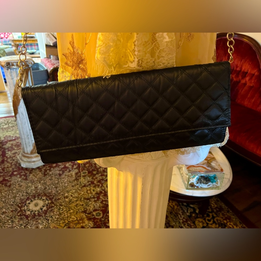 Chi mini purse. Great for an evening out or a special occasion black satiny feel